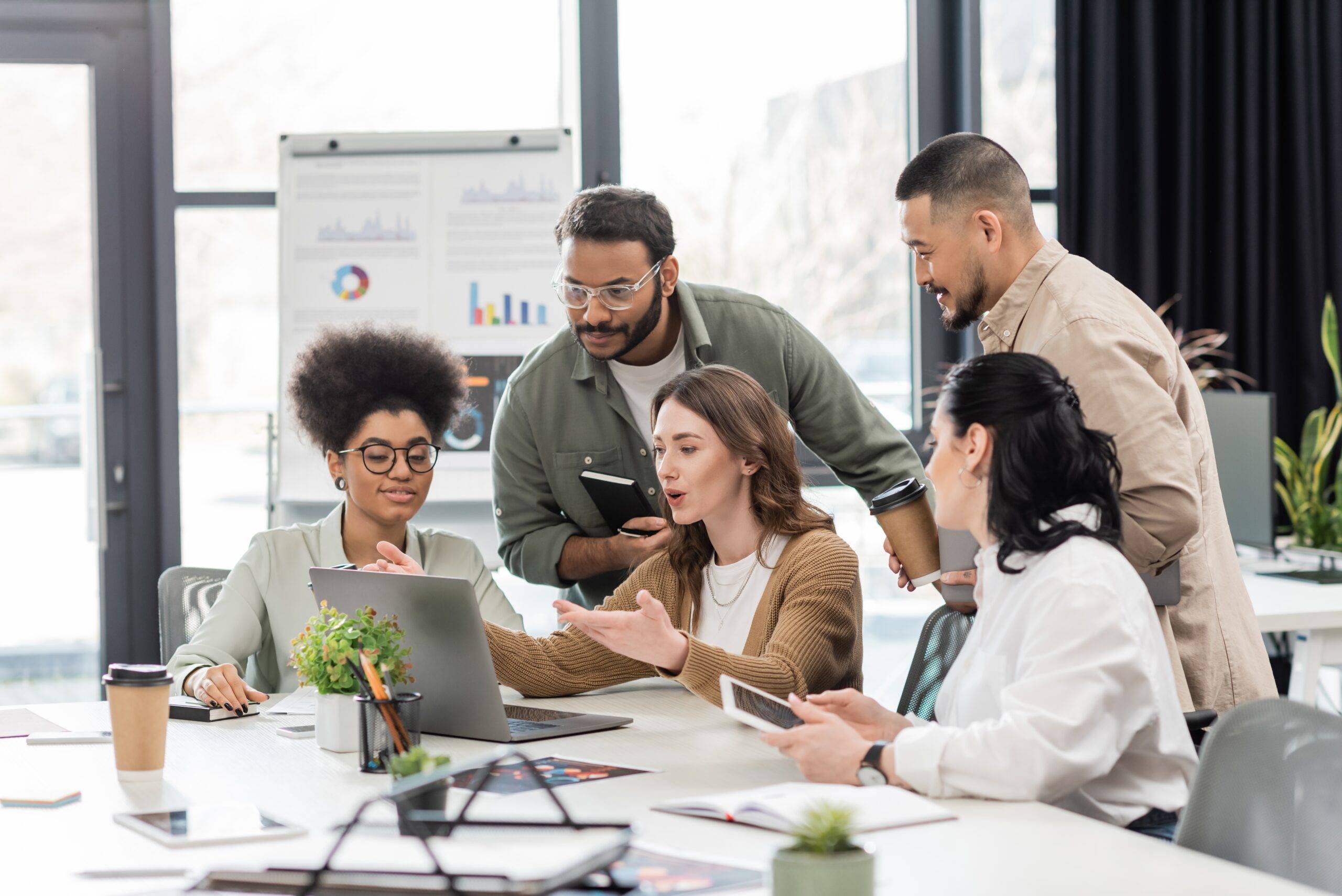 a team discussing their employee feedback program